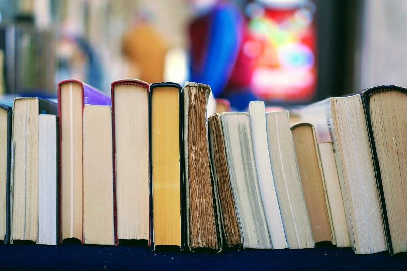 16 books on a shelf