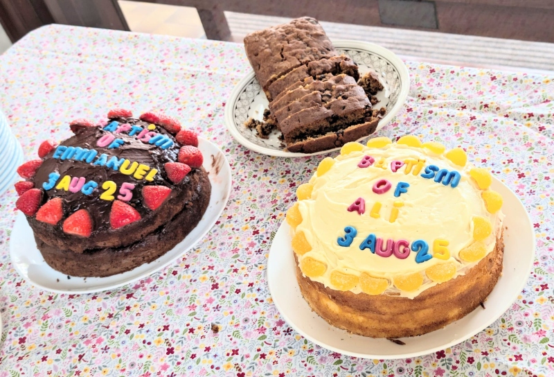 3 cakes, 2 of which displayed the name of a baptismal candidate - Ali and Emmanuel