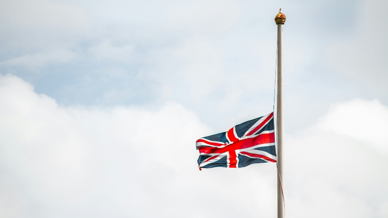 Union Jack flag attached to a pole