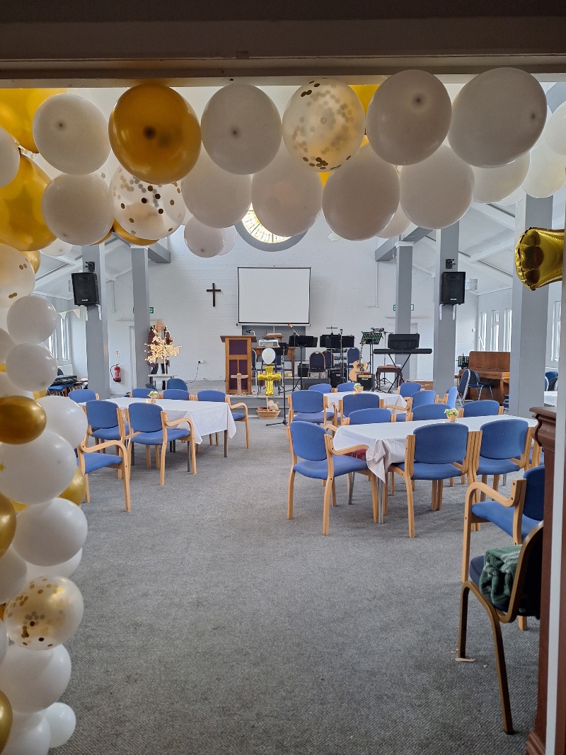 Laird St anniversary - church building decorated with balloons