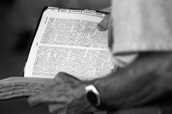Man reading Bible John700 