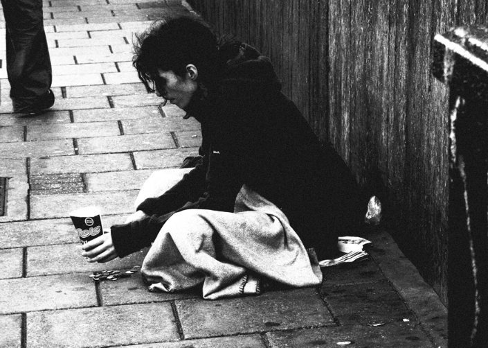 Woman begging on the street